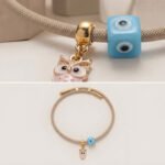 Χειροποίητο Beige Κολιέ με Χρυσές Λεπτομέρειες & Charms (Κουκουβάγια & Μάτι) - Image 3